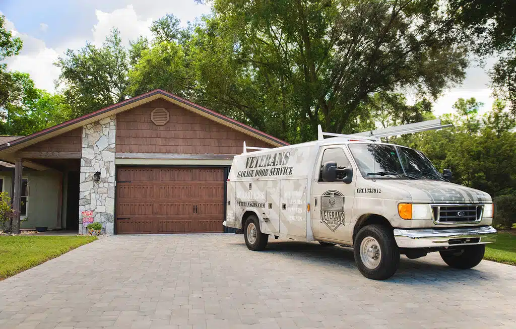 Elevating Home Security And Convenience With Veterans Garage Door WICZ   Veteran Garage Doors Garage Door Residential High Res With Truck .webp